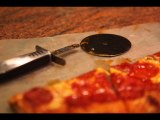 The Pizza Cutter Mid-Action Shot